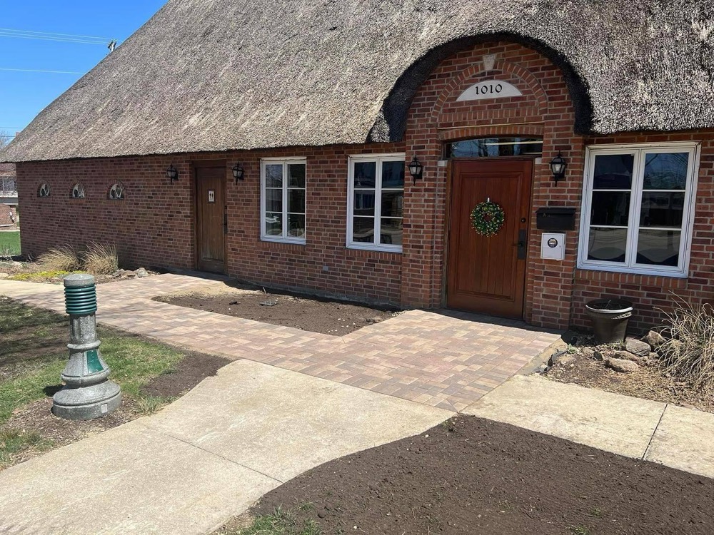Paver walkway and entry approach installed by Petersen Landscaping